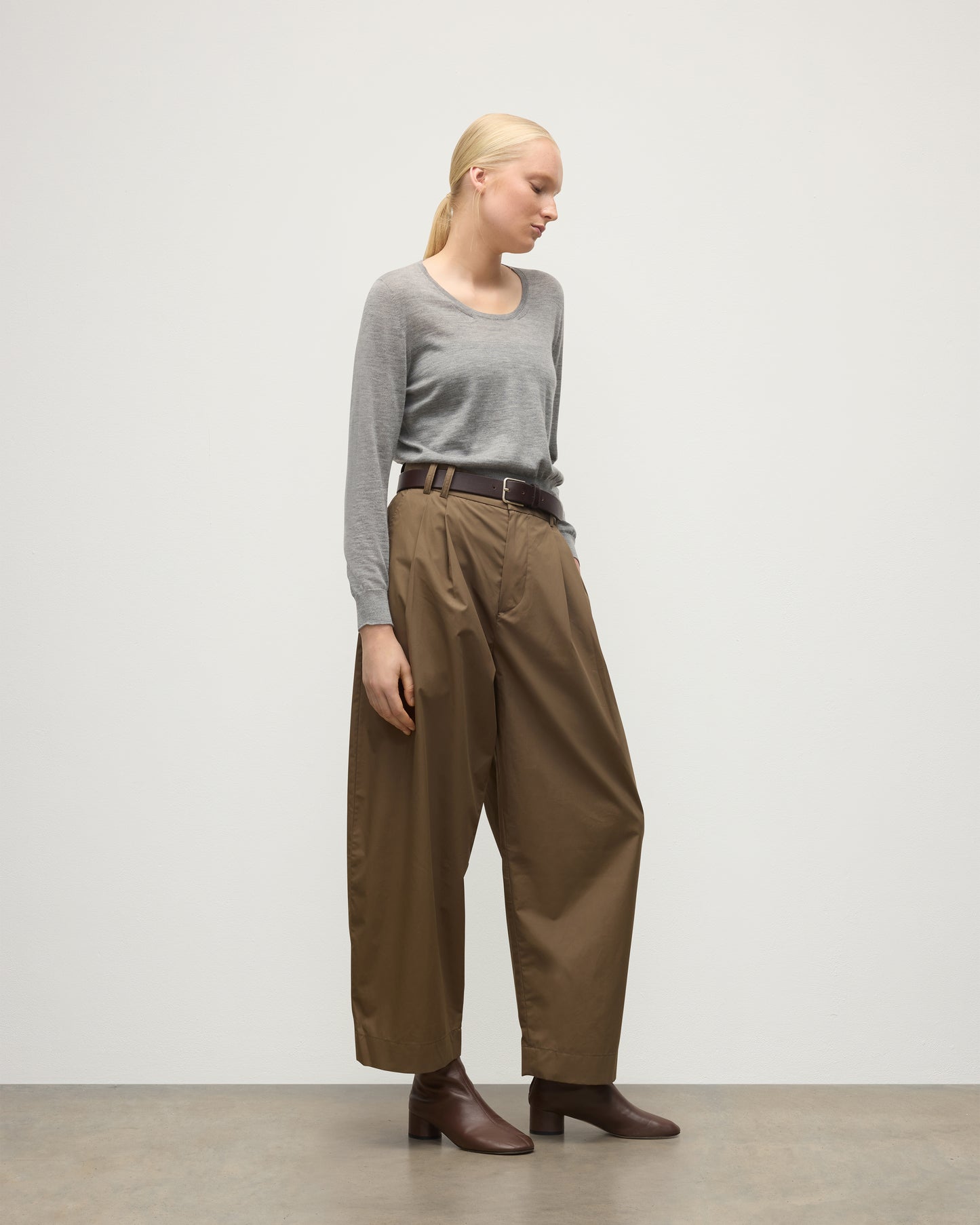 MODEL WEAR JOHNSTONS OF ELGIN WOMENS ELLA SCOOP SWEATER GREY WITH BROWN WIDE LEG TROUSERS AND BROWN BOOTS KAI05723HA4253