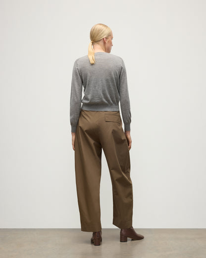 MODELS BACK WEARING JOHNSTONS OF ELGIN WOMENS ELLA SCOOP SWEATER GREY WITH BROWN WIDE LEG TROUSERS AND BROWN BOOTS KAI05723HA4253