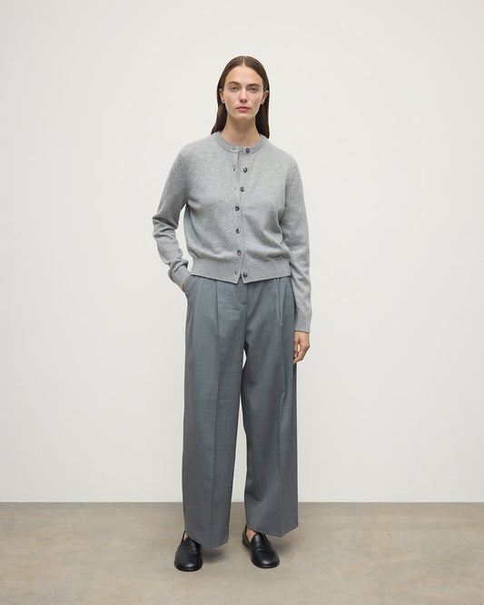 Model wears Johnstons of Elgin AW25 Women's Knitwear Light Grey Classic Cashmere Grey Cardigan Front KAP05573HA0308