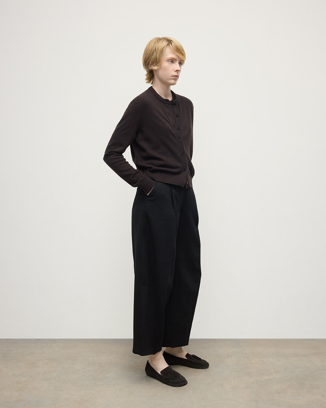 Model wears Johnstons of Elgin AW25 Women's Knitwear Molasses Classic Cashmere Brown Cardigan Side KAP05573SB7290