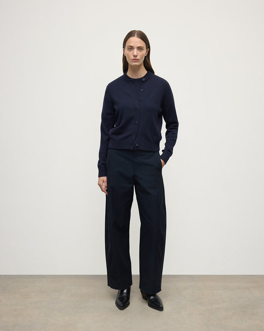 Model wears Johnstons of Elgin AW25 Women's Knitwear Dark Navy Classic Cashmere Navy Cardigan Front KAP05573SD7666