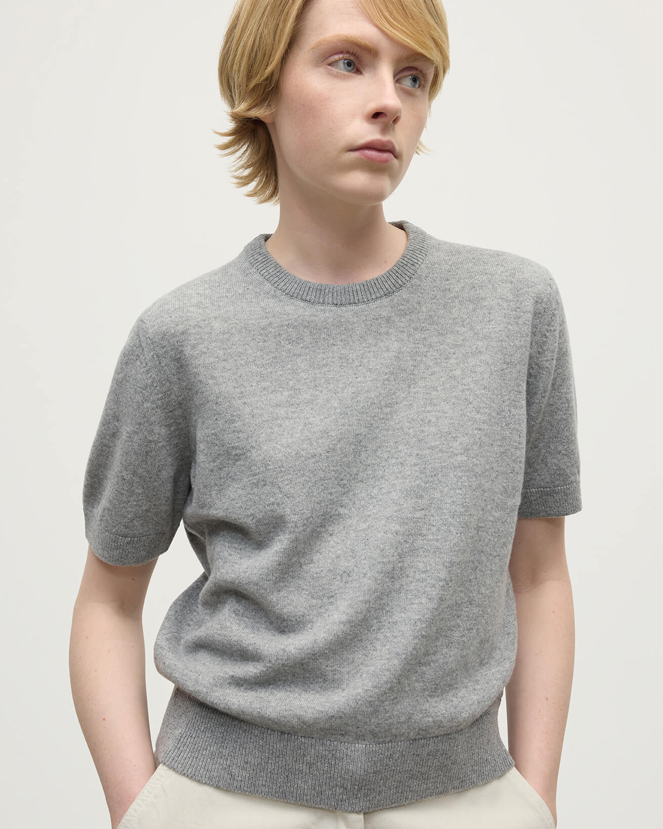 Model wearing Johnstons of Elgin AW25 Women's Knitwear Light Grey Classic Cashmere Grey T-shirt Close Up KAP05574HA0308