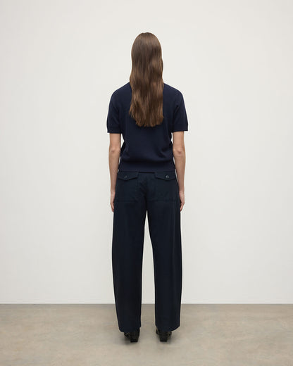 Model wearing Johnstons of Elgin AW25 Women's Knitwear Dark Navy Classic Cashmere Navy T-shirt Back View KAP05574SD7666