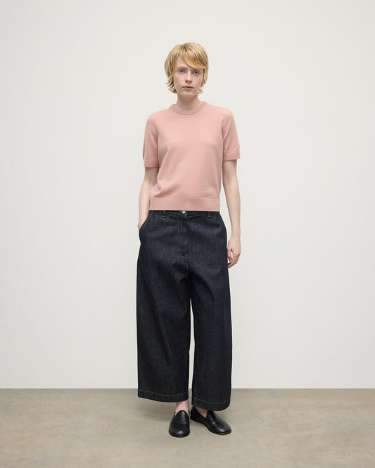 Model wearing Johnstons of Elgin AW25 Women's Knitwear Nude Classic Cashmere Pink T-shirt Front KAP05574SE0740