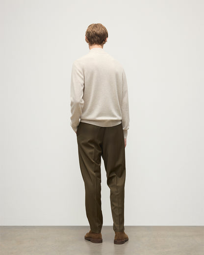 MODEL WEARING JOHNSTONS OF ELGIN MENS RORY CLASSIC HALF ZIP CLASSIC SWEATER 100% CASHMERE WITH OLIVE GREEN TROUSERS KAP05695HA0402