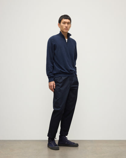 MODEL WEARS JOHNSTONS OF ELGIN MENS RORY CLASSIC HALF ZIP CLASSIC SWEATER 100% CASHMERE  OVER A WHITE T-SHURT WITH NAVY TROUSERS KAP05695HD7350
