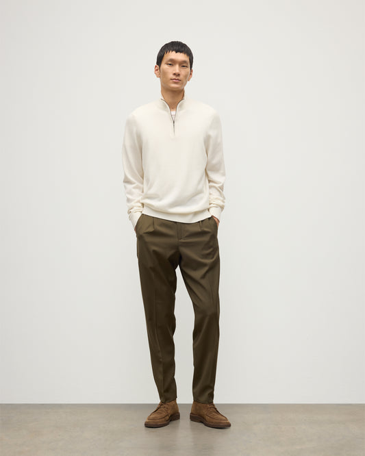 MODEL WEARS JOHNSTONS OF ELGIN MENS RORY CLASSIC HALF ZIP CLASSIC SWEATER 100% CASHMERE OVER A WHITE T0SHIRT WITH OLIVE GREEN TROUSERS KAP05695SA0606
