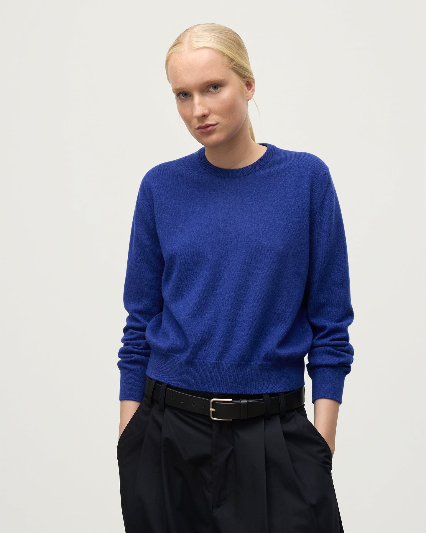 MODEL WEARS JOHNSTONS OF ELGIN WOMENS LUNAN CLASSIC CREW SWEATER BLUE KAP05784SD5326