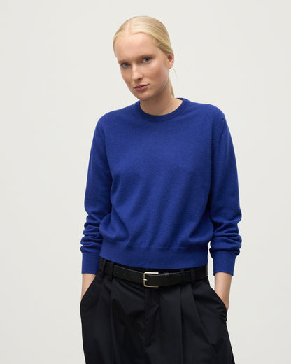 MODEL WEARS JOHNSTONS OF ELGIN WOMENS LUNAN CLASSIC CREW SWEATER BLUE KAP05784SD5326