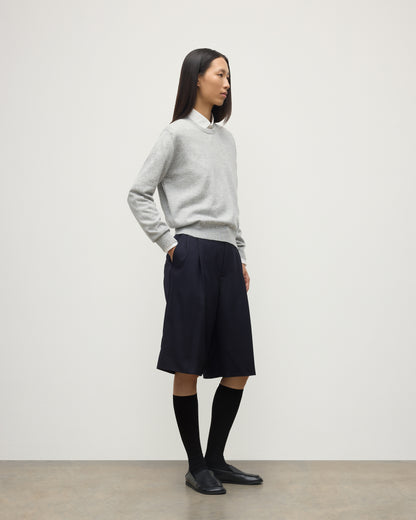 MODEL WEARING JOHNSTONS OF ELGIN WOMENS LUNAN CLASSIC CREW SWEATER GREY WITH BLACK LONG SHIRTS KAP05784HA0399