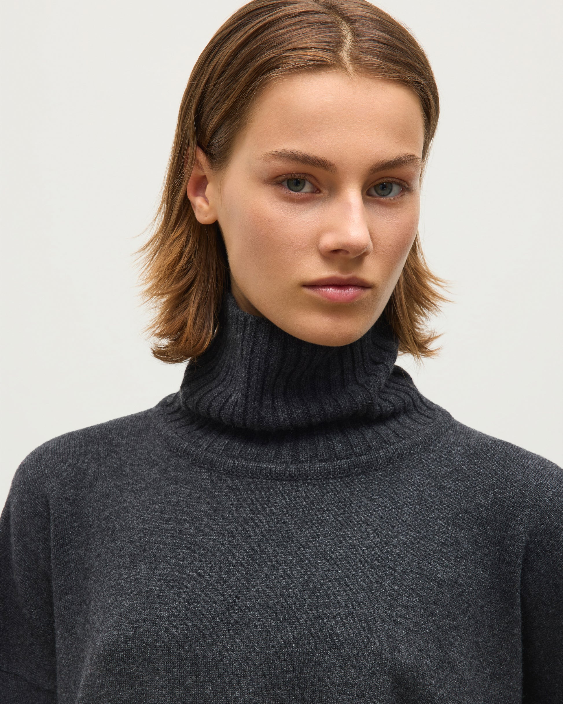 JOHNSTONS OF ELGIN JESSIE ROLL NECK SWEATER CASHMERE ROLL NECK SWEATER WITH EXPOSED SEAM DETAIL & CENTRE BACK SPLIT - 2 PLY DARK GREY 100% CASHMERE KAP05987Q26343