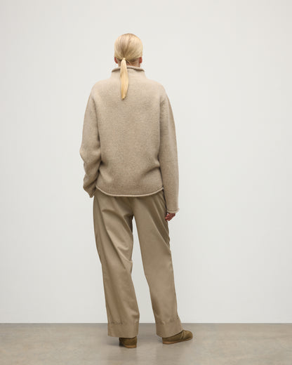 FEMALE MODEL WEARING JOHNSTOS OF ELGIN KESTER FUNNEL NECK SWEATER NATURAL 100% CASHMERE UAC05753006876