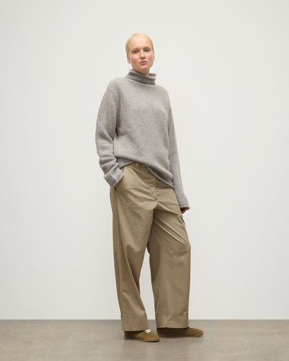 FEMALE MODEL WEARING JOHNSTONS OF ELGIN KESTER FUNNEL NECK SWEATER BLUE 100% CASHMERE UBB01067HD4499