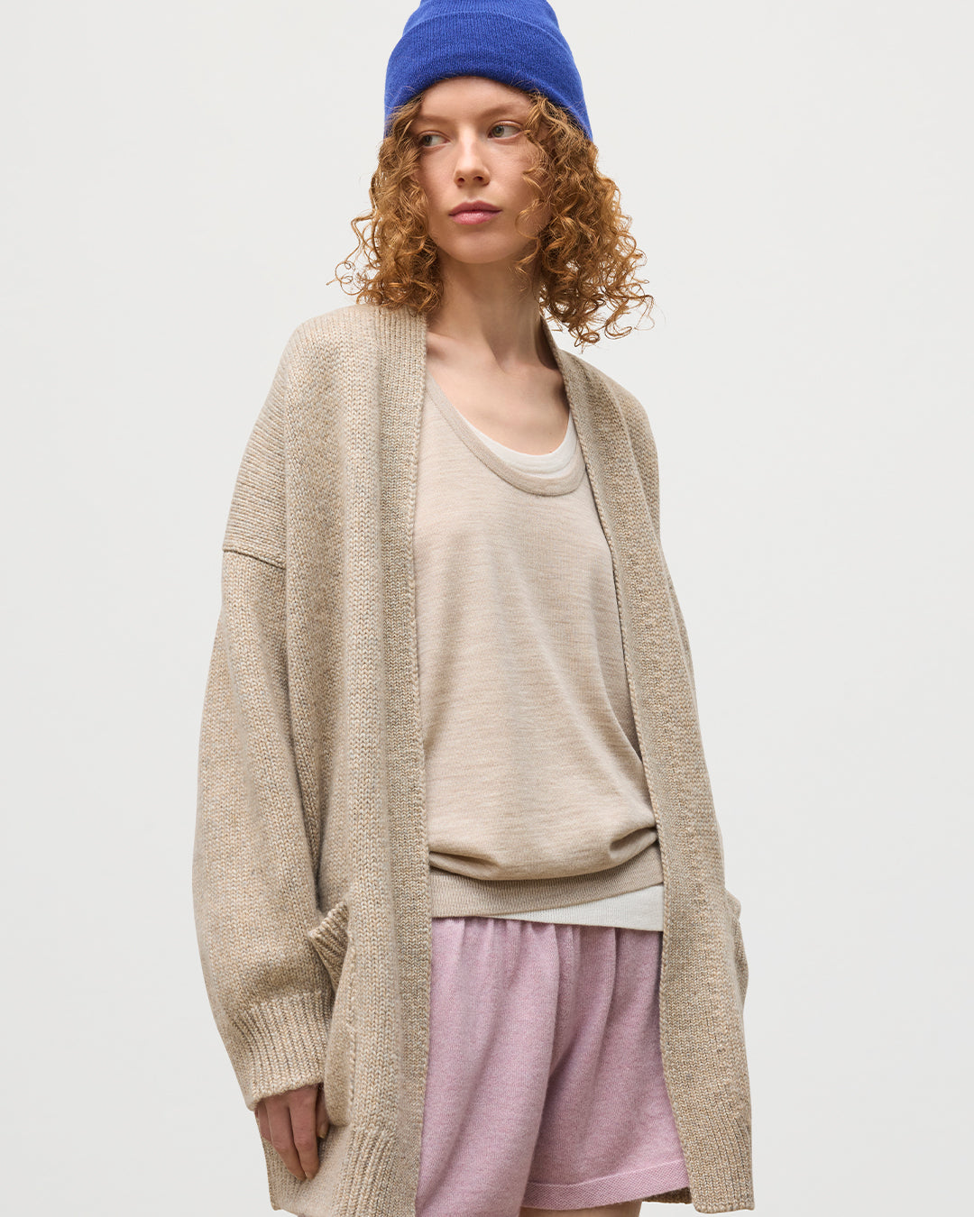 JOHNSTONS OF ELGIN WOMENS BAY SLOUCH CARDIGAN NATURAL 78% CASHMERE 22% COTTON WITH COVE CSAHMERE SHORTS, GREER MERINO VEST, AND BRAEMAR CASHMERE BEANIE IN RONAY BLUE KBB01069HB4453