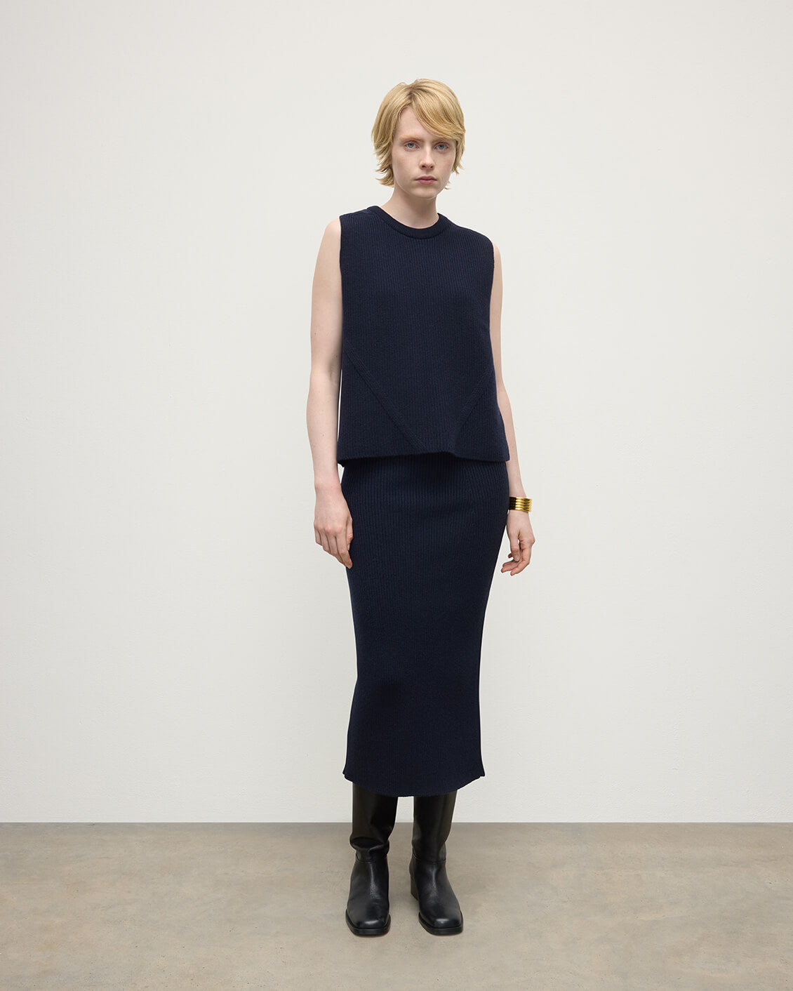 Model wearing Johnstons of Elgin AW25 Women's Knitwear Dark Navy Sleeveless Navy Cashmere Tank Top KBI01037SD7666