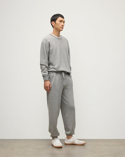 MALE MODEL WEARS JOHNSTONS OF ELGIN MENS KIRK SWEATPANTS LIGHT GREY 97% CASHMERE 3% POLYESTER WITH LIDDEL CASHMERE SWEATSHIRT KBP00948HA0308