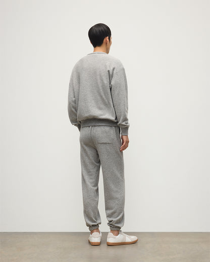 MALE MODEL WEARS JOHNSTONS OF ELGIN MENS KIRK SWEATPANTS LIGHT GREY 97% CASHMERE 3% POLYESTER WITH LIDDEL CASHMERE SWEATSHIRT KBP00948HA0308