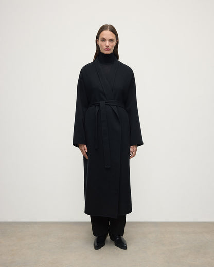 Model wears Johnstons of Elgin Women's Tailoring Black Black Cashmere Wrap Coat Front View TA000621RU6432
