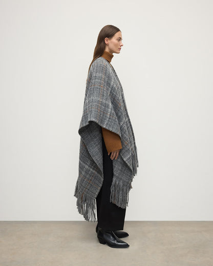 model wearing Johnstons of Elgin AW25 Woven Accessories  Grey Texture Cape Side TB000748RU7663ONE
