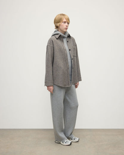 Model wearing Johnstons of Elgin  Women's Tailoring Ash Small Glen Urquhart Glen Urquhart Check Oversized Shirt Side View TB000754RU7675