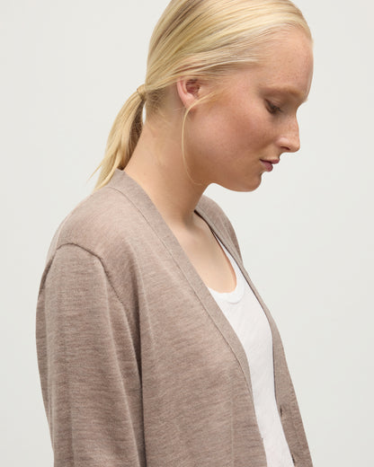 FEMALE MODEL WEARING JOHNSTONS OF ELGIN FORSYTH SUPERFINE VEE NECK CARDIGAN LIGHT BROWN  UAI05740HB0273