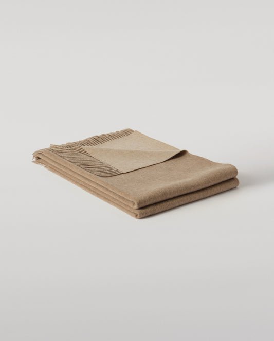 Johnstons of Elgin Interiors Collection Otter & Oatmeal Reversible Cashmere Throw on a grey background  WA000013RU7622ONE