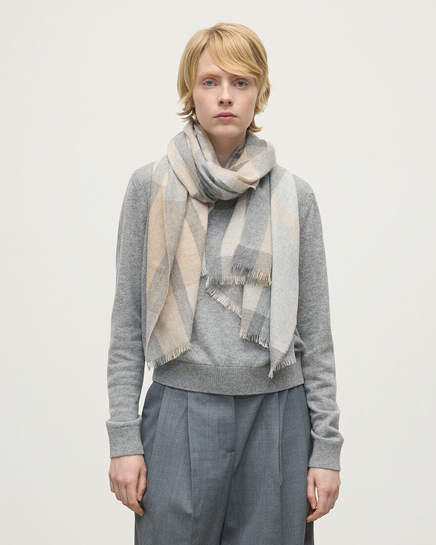 model wears Johnstons of Elgin AW25 Woven Accessories Natural Madras Check Cashmere Stole WA001174RU7660ONE