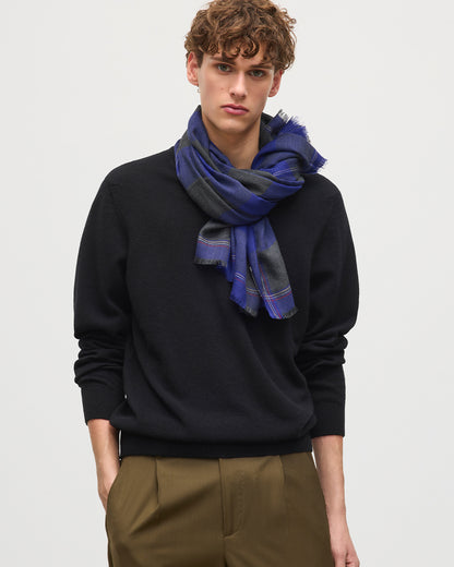 MODEL WEARS JOHNSTONS OF ELGIN CARNBEE LARGE GINGHAM SCARF NAVY 100% CASHMERE OVER NAVY  CASHMERE SWEATER WA002476RU7710ONE