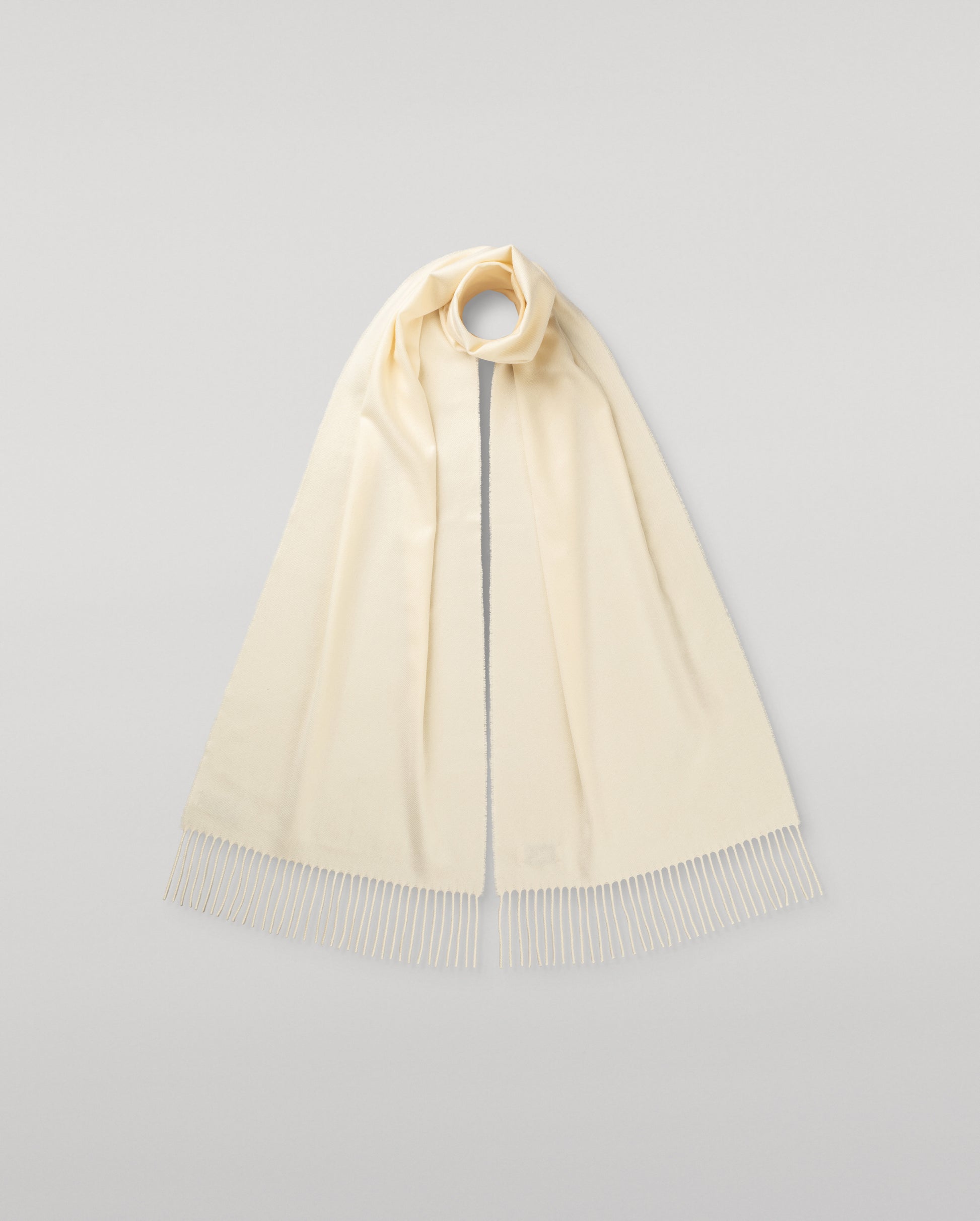 Johnstons of Elgin Oversized Cashmere Scarf in White on a white background WA000057SA0000N/A
