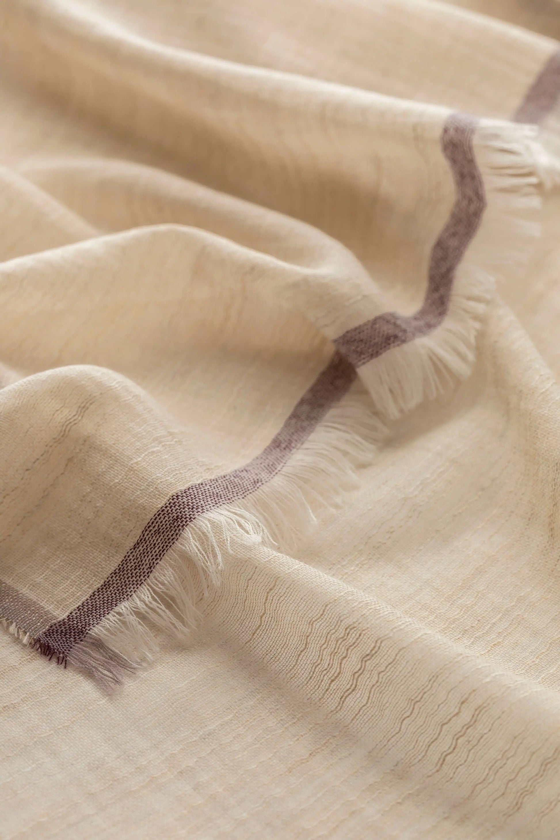 Johnstons of Elgin SS25 Accessories Natural Colour Border Lightweight Scarf close up fabric detail WB002693RU7595ONE